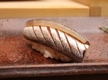 ein Foto von Gefleckter Pazifikhering Sushi