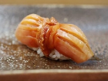 A photo of akagai nigiri